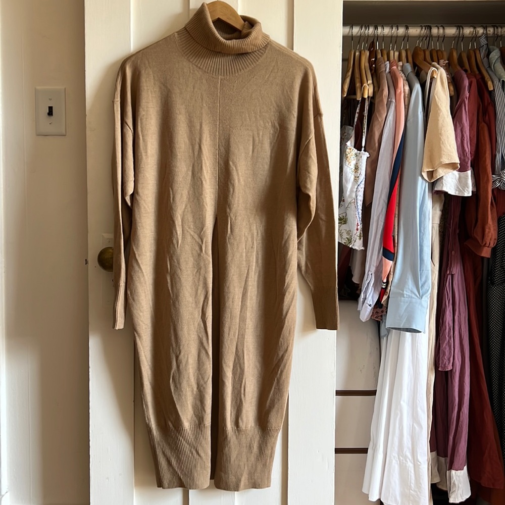 universal standard merino wool long length turtleneck sweater with front slit